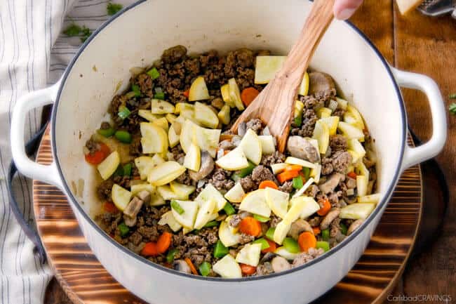 Showing how to make Cheesy Tortellini by cooking ingredients.