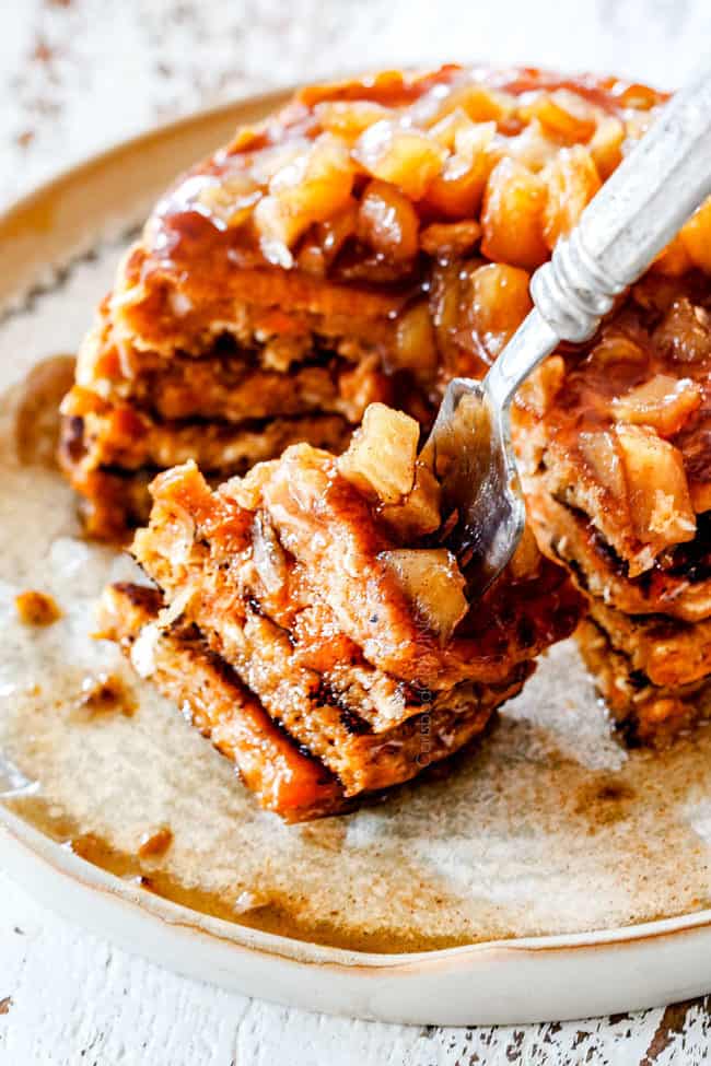 cinnamon apple syrup on a bite of sweet potato pancakes