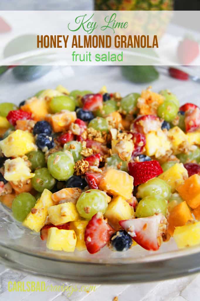 healthy creamy fruit salad with yogurt in a glass bowl