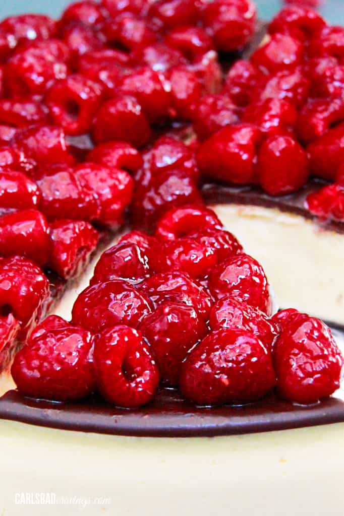 close up view of a chocolate raspberry cheesecake 