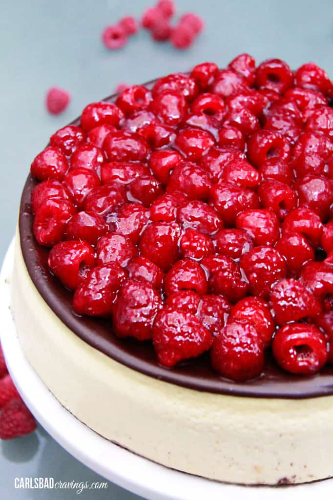 chocolate ganache cheesecake with fresh raspberry topping 