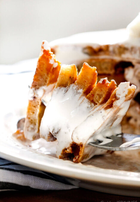 These AMAZING S'mores Pancakes make the funnest breakfast or dessert and are super easy! My nieces and nephews beg me to make them and I have to admit I can't enough of the marshmallow syrup! Don't skip the butterscotch chips!