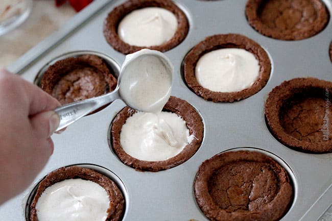 Showing how to make Peppermint Eggnog Brownie Cups by adding white chocolate eggnog to the cups.