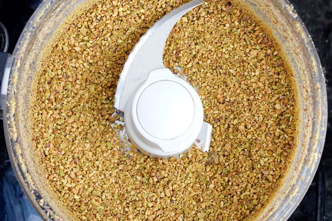 showing how to make easy chicken cordon bleu by processing breading in food processor