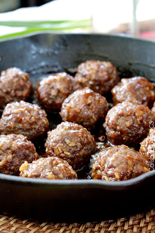showing how to make Aloha Subs by cooking Hawaiian Meatballs in sauce in a skillet