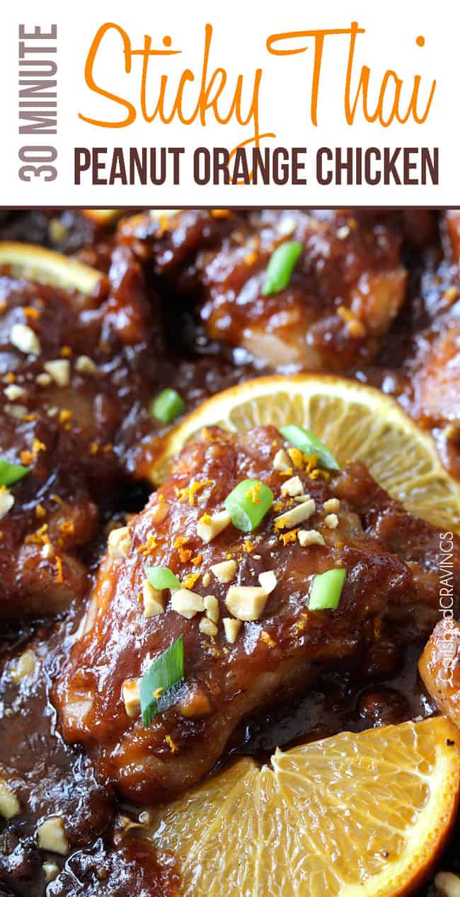 Close up of Sticky Thai Peanut Orange Chicken with nuts and chive garnish.