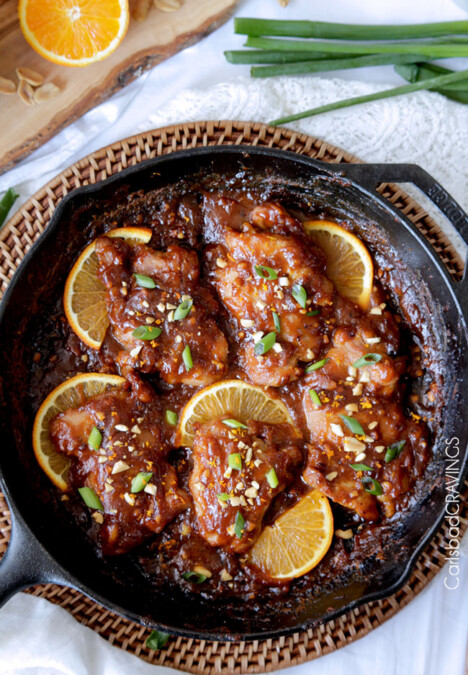 One pan, 30 minute easy Sticky Thai Peanut Orange Chicken baked in one of my favorite rich, nutty, sweet, savory orange sauces ever. I am so in love with the flavors and ease of this dish! #thai #orangechicken #peanutchicken #thaipeanutchicken #drumsticks #30minutemeals