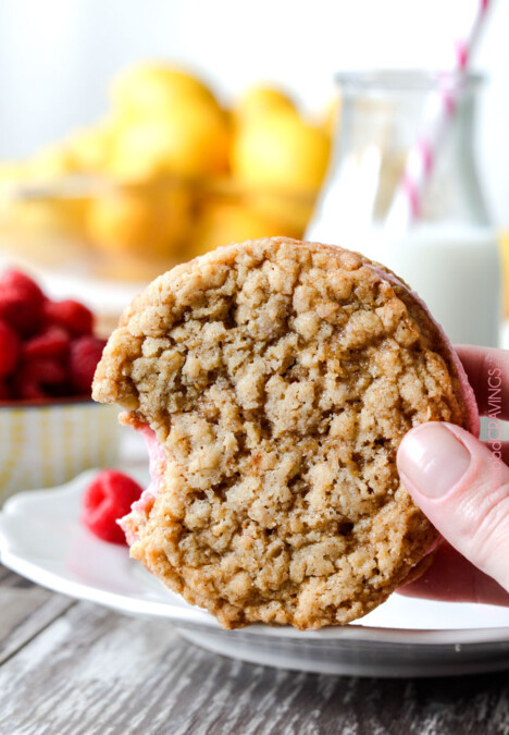 Two large, soft, chewy buttery lemon oatmeal cookies sandwiching creamy raspberry frosting = AMAZING!