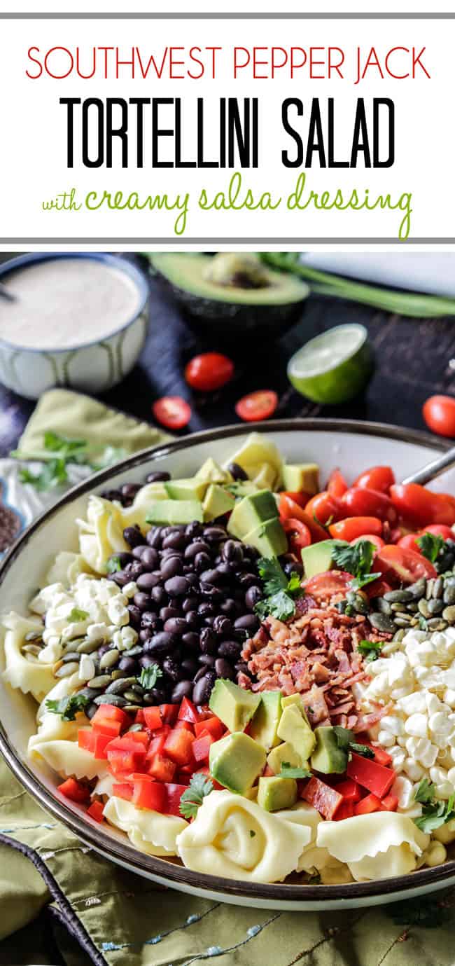 Make ahead, favorite potluck Southwest Pepper Jack Tortellini Salad = cheesy pillows of tortellini, sweet corn, black beans, avocado, bell peppers, etc. bathed in Creamy Salsa Dressing and garnished with bacon, Pepper Jack, sunflower seeds. Oh my YUM! #tortellini #pastasalad #southwest #salad