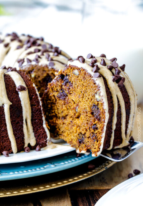 Moist, rich Chocolate Chip Pumpkin Cake infused with chocolate and bathed in in Cinnamon Pumpkin Cream Cheese Glaze is SO good! The only cake you need for Fall!