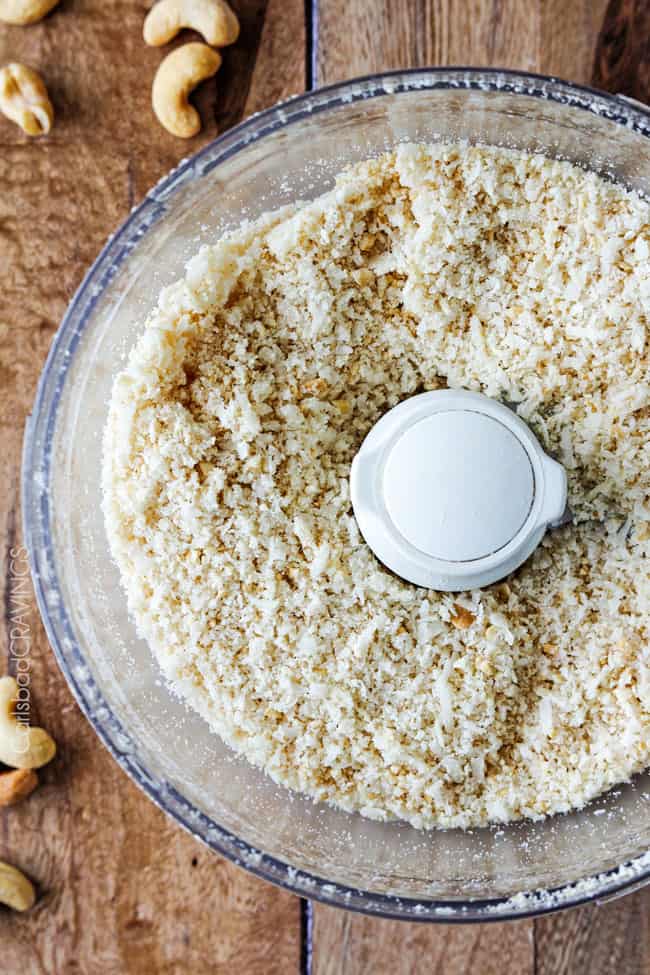 Showing how to make Coconut Shrimp by blending ingredients in a food processor.