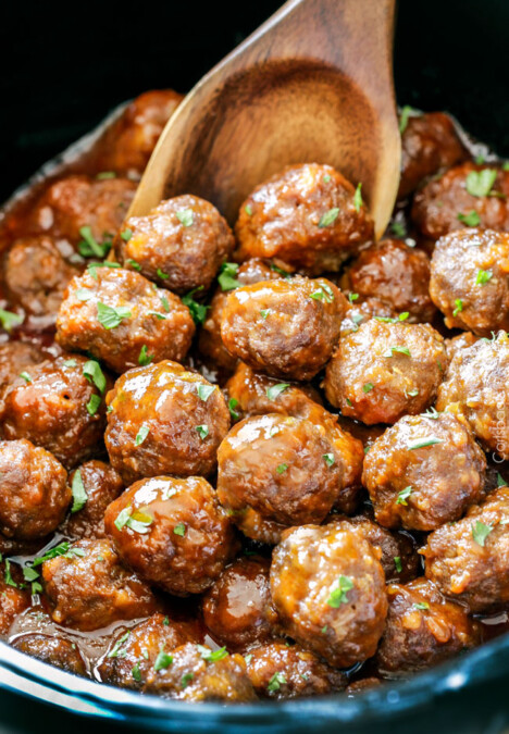 Tender juicy slow cooker Honey Buffalo Meatballs simmered in the most tantalizing sweet heat sauce that everyone goes crazy for! Perfect appetizer or delicious, easy meal with rice!
