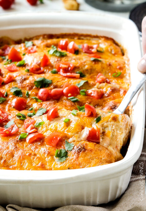 Easy, hearty Breakfast Enchiladas stuffed with your favorite breakfast ingredients then smothered with intoxicatingly delicious Creamy Salsa Sauce! These enchiladas are totally customizable, perfect for your leftover holiday ham AND you can assemble the night before and bake the next day!