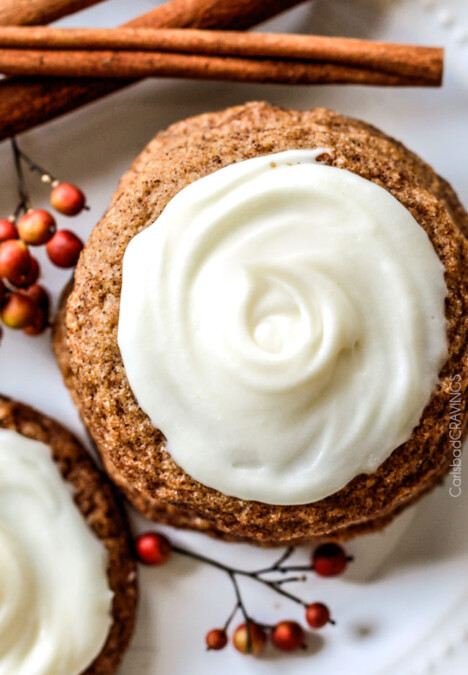 Soft and Chewy Snickerdoodle Gingersnap Cookies with Eggnog Frosting are melt in your mouth delicious infused with deep, rich molasses, ginger, cinnamon and cloves. Our favorite Christmas Cookie!