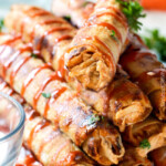 Super easy Slow Cooker Honey Buffalo Chicken Taquitos bursting with sweet heat cream cheese chicken filling you will want to eat it with a spoon! Perfect party appetizer that everyone will go crazy for or easy favorite meal!