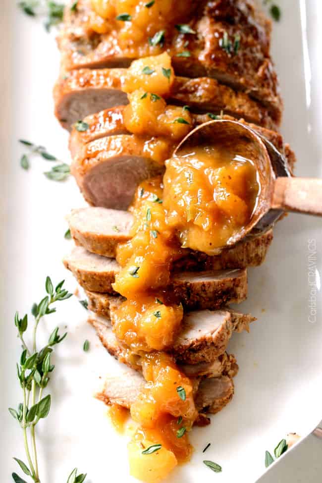 showing how to serve oven pork tenderloin by adding glaze