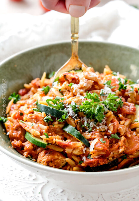 ONE POT Italian Chicken and Orzo (and veggies!) in a creamy Parmesan tomato sauce on your table in almost 30 minutes and all made in one pot!