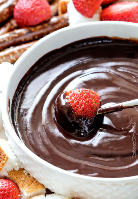 Slow Cooker Chocolate Fondue - EASY, velvety chocolate is the perfect make ahead party or special occasion appetizer or dessert. Perfect for Valentine's Day or baby/bridal showers!