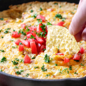 One Skillet Cheesy Salsa Verde Corn Dip is creamy cheesy, packed with flavor and one of the easiest, tastiest appetizers you will ever make!