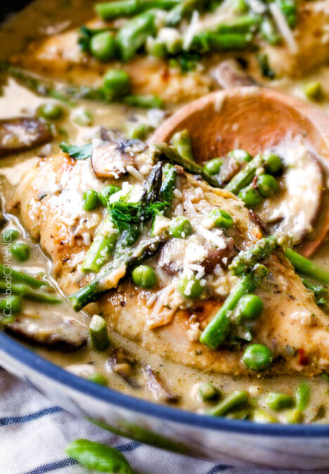 Creamy Parmesan Pesto Chicken Skillet - this is the BEST one skillet Chicken! the chicken is rubbed in pesto/Parmesan for amazing flavor and the sauce is the creamiest, most flavorful, all done in 30 minutes! I love mine with pasta, my husband loves his with potatoes!