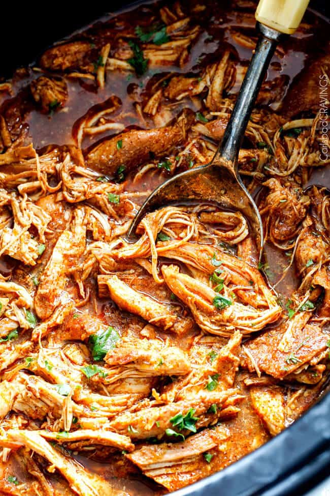 Slow Cooker Salsa Verde Honey Lime Chicken (and Tacos!) - the flavor of this chicken is out of this world! the best "dump and run" meal I have ever made! Love the sweet, tangy spicy Mexican chicken for tacos, burritos, tostadas, salads, etc. Couldnโt be any easier!