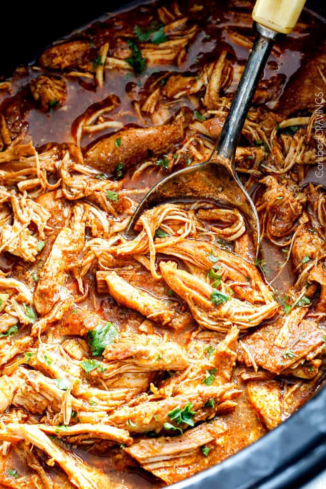 Slow Cooker Salsa Verde Honey Lime Chicken (and Tacos!) - the flavor of this chicken is out of this world! the best "dump and run" meal I have ever made! Love the sweet, tangy spicy Mexican chicken for tacos, burritos, tostadas, salads, etc. Couldnโt be any easier!