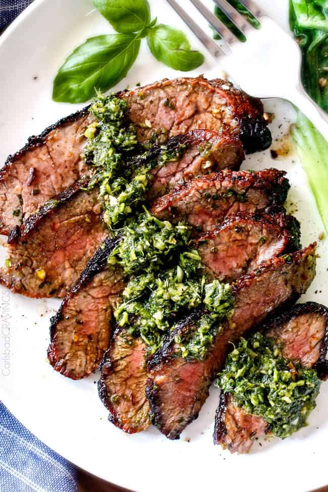 Top photo of of Grilled Asian Steak with Chimichurri sauce on top.