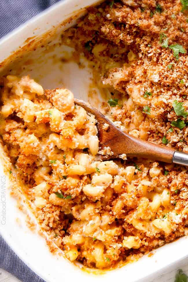 A scoop of fresh baked Million Dollar Macaroni and Cheese.