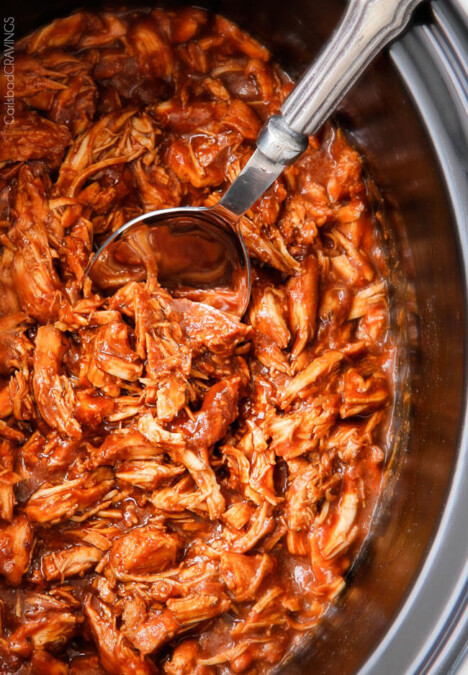 Slow Cooker BBQ Chicken - this is our family's favorite BBQ chicken! Its tender, tangy, sweet, smoky and the homemade barbecue sauce is out of this world! I love making this for busy days or large gatherings!