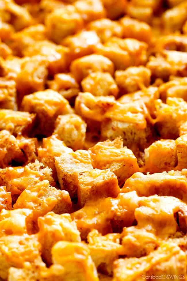 Showing how to make Bacon Ranch Chicken Salad by cooking the croutons.