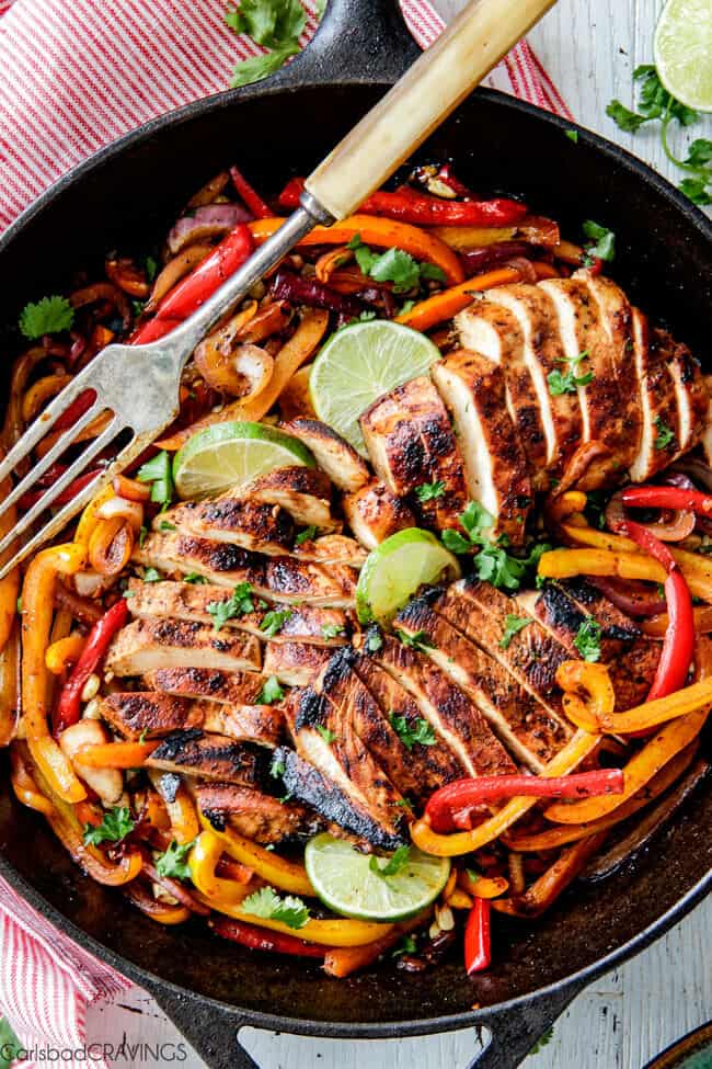 Showing a cooked pan of Chicken Fajitas.