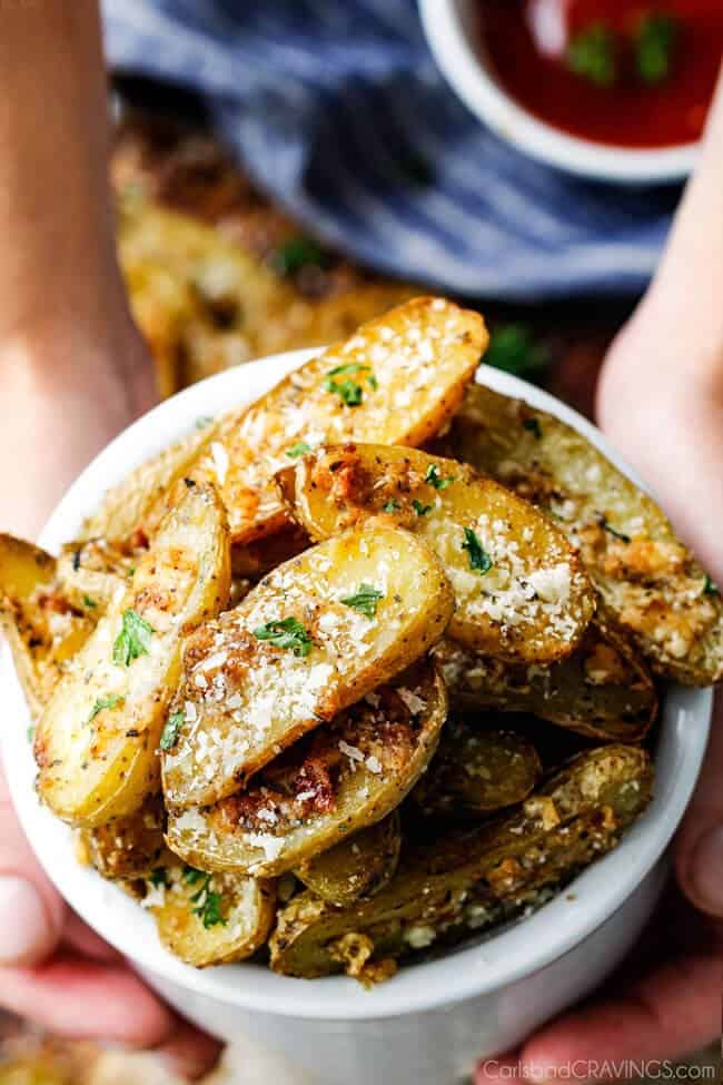 Easy baked Parmesan Fingerling Potato Fries with a crispy exterior and creamy buttery interior make the perfect appetizer, snack or side you won't be able to stop munching!