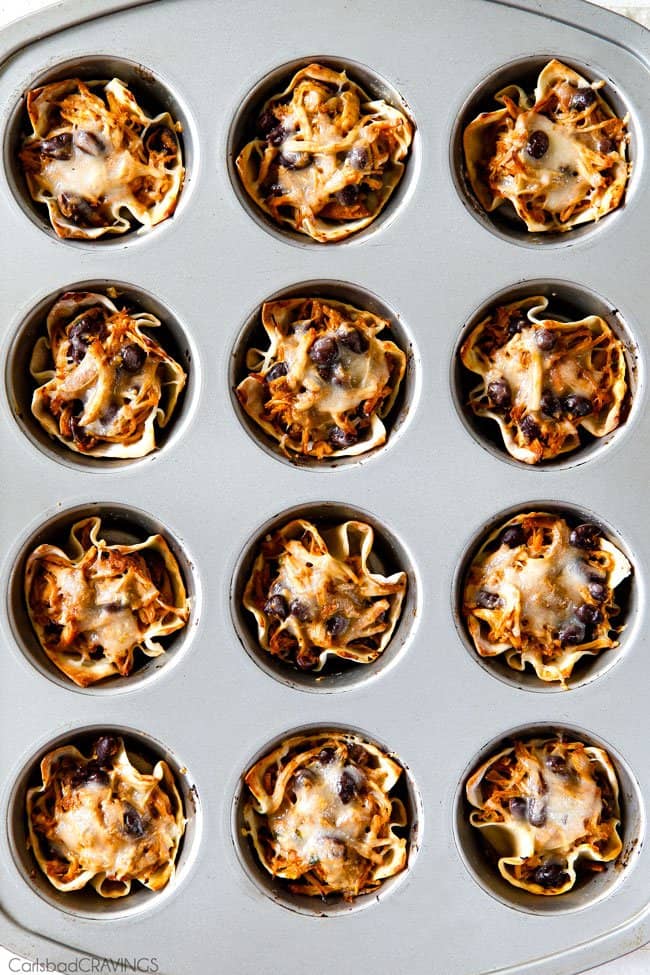 Showing how to melt the cheese on the Salsa Verde Honey Lime Chicken Taco Cups