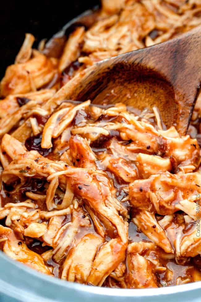 20 Minute Chipotle BBQ Cranberry Turkey Sliders (or chicken!) are a wonderfully delicious way to devour your Thanksgiving turkey leftovers or SO good you will want to make them forever and ever with chicken! And donโt skip the crunchy, sweet and tangy out of this world Apple Poppy Seed Slaw! up close of saucy barbecue turkey for turkey sliders