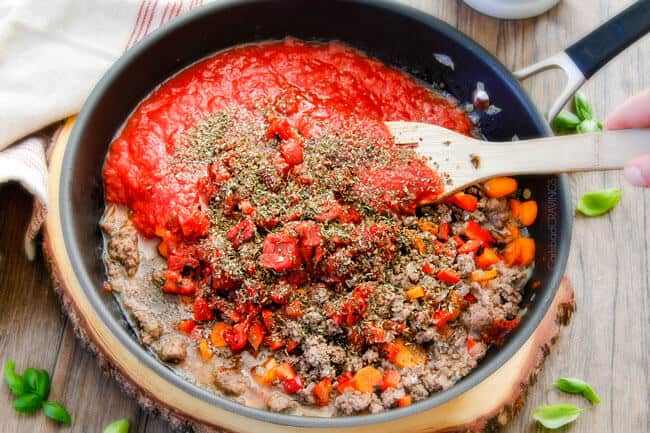 One Skillet Cheesy Penne - the best homemade ragu sauce simmered right with the pasta then loaded with cheese! My family begs me to make this weekly!