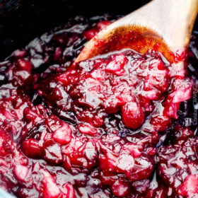 Pineapple Cranberry Sauce โ so much better than canned and SO easy! Sweet and tangy and so company rave worthy! This will be your new favorite cranberry sauce for Thanksgiving!
