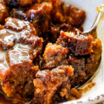 showing how to serve pumpkin bread by pouring caramel over top and eating in a bowl with a spoon