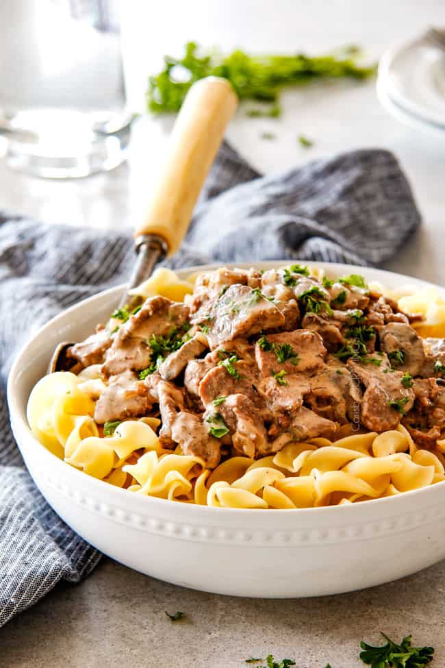 This is by far my family's favorite Slow Cooker Beef Stroganoff recipe! An ultra rich and creamy, amazingly flavorful sauce (without any "cream of" anything!), crazy tender meat all made in the crockpot for a gourmet meal with hardly any effort! I love serving this for holidays like Christmas!