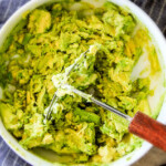 This creamy Guacamole Hummus is SO addicting and only 3 ingredients! Its crazy flavorful, healthy and super easy!