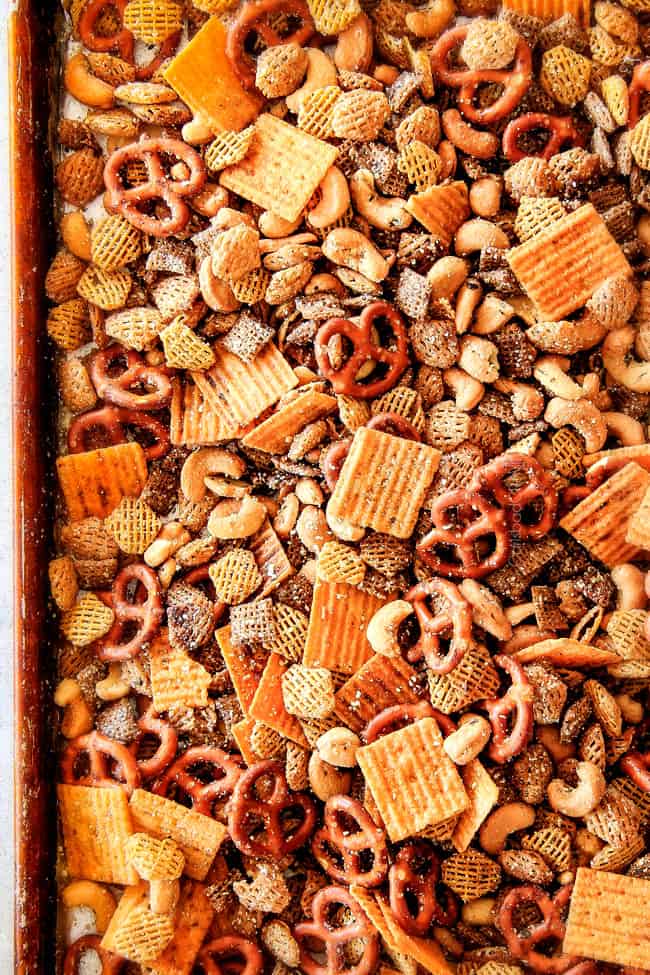 Make ahead crunchy, salty, savory Italian Parmesan Party Mix bursting with Italian flavor in each cashew, pretzel, chex mix bite! This is my go-to party snack that everyone begs me to make!