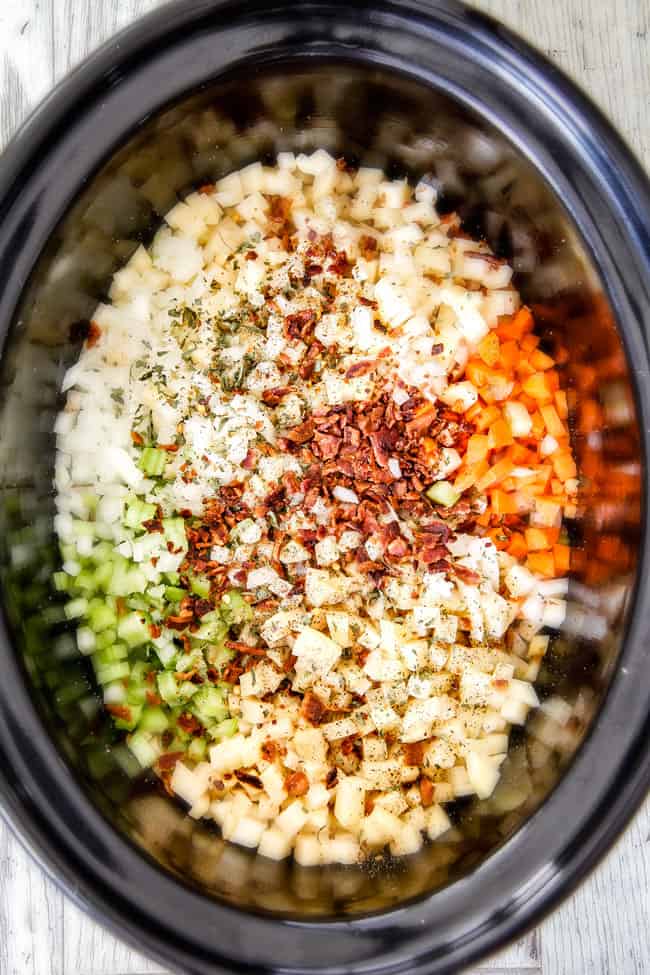 This Skinny Slow Cooker Potato Soup is unbelievably creamy, super flavorful and absolutely the best I've ever tried! and its super easy in the crock pot! showing how to make crockpot soup by adding potatoes, bacon, celery, carrots to slow cooker