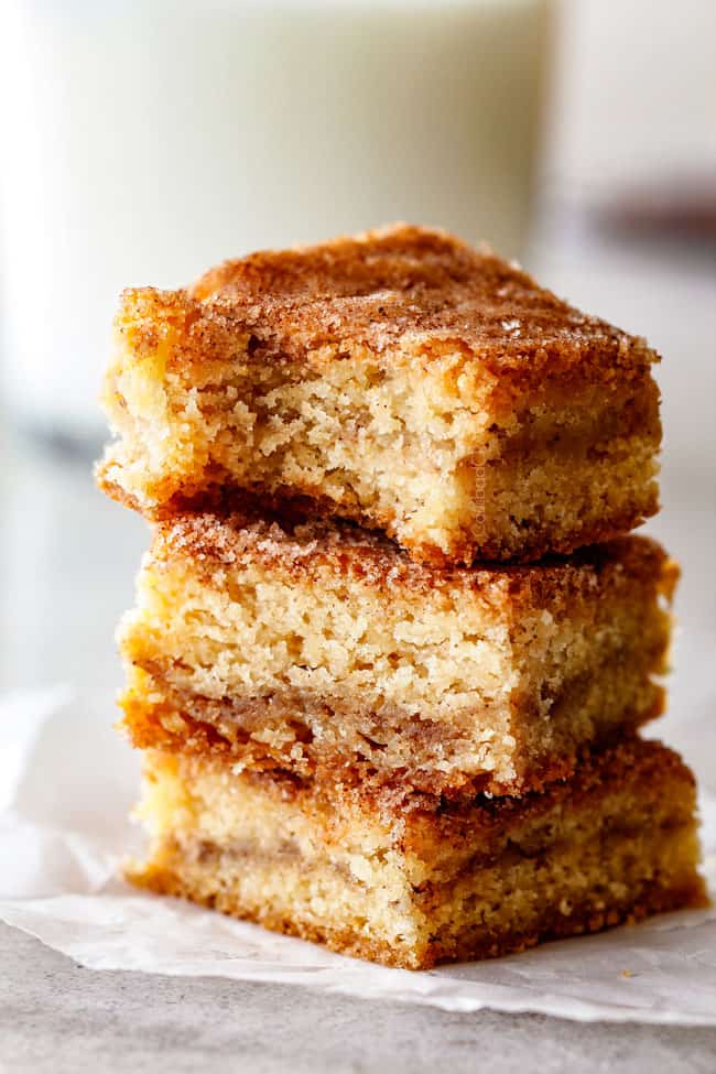 Incredibly EASY, thick, soft and chewy, buttery Snickerdoodle Cookie Bars taste just like the cookie but so much easier and less time consuming! The cinnamon and sugar crackle top is to die for!