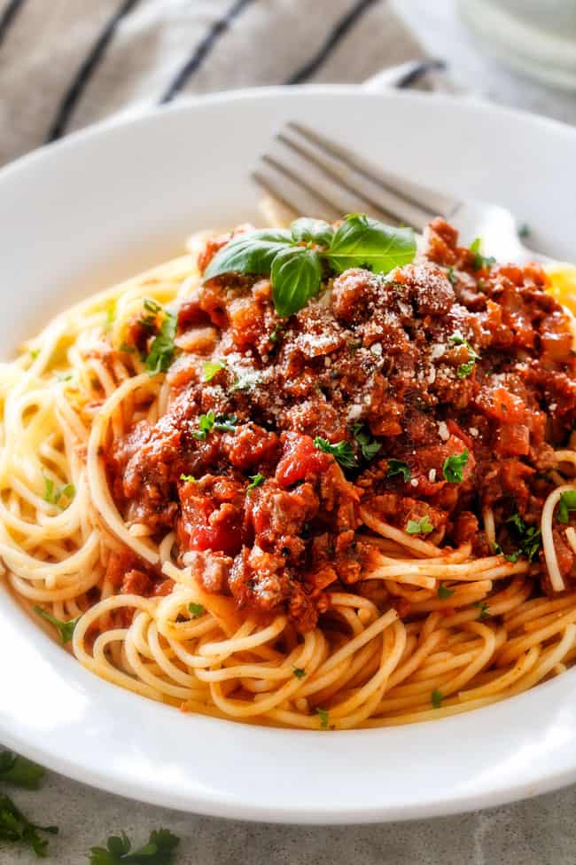 Quick and easy Weeknight Spaghetti Bolognese bursting with flavor on your table in under 30 minutes but tastes like its been simmering all day! We make this recipe more than ANY OTHER RECIPE!