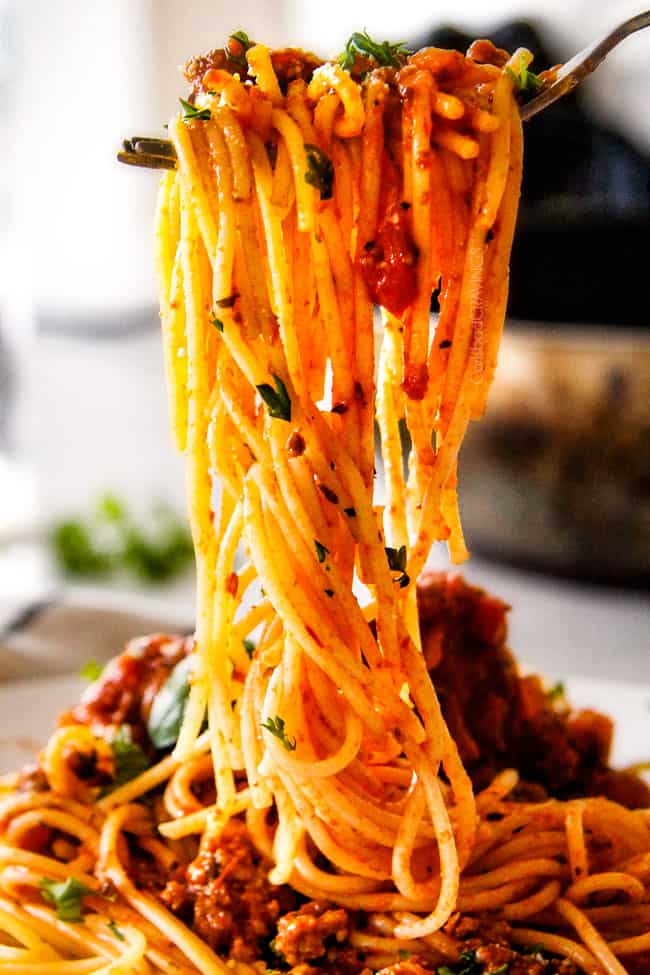 Quick and easy Weeknight Spaghetti Bolognese bursting with flavor on your table in under 30 minutes but tastes like its been simmering all day! We make this recipe more than ANY OTHER RECIPE!