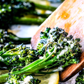 Roasted Parmesan Lemon Garlic Broccoli (or Broccolini) is bursting with flavor, caramelized edges and the easiest side dish to every meal!
