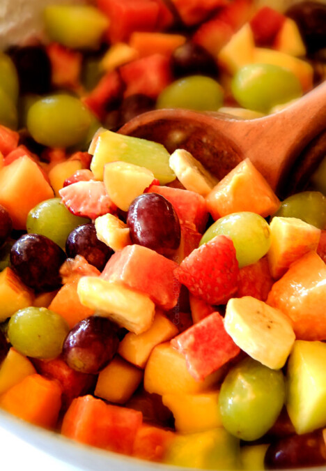 Strawberry Melon Fruit Salad with Creamy Citrus Glaze - I took this to a barbecue and it was gone in minutes! Its so cool and refreshing withe the BEST GLAZE and I love the combo of melons, strawberries, bananas, apples and grapes!