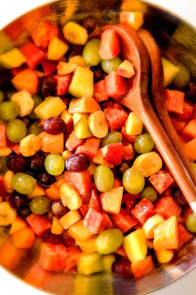 Strawberry Melon Fruit Salad with Creamy Citrus Glaze - I took this to a barbecue and it was gone in minutes! Its so cool and refreshing withe the BEST GLAZE and I love the combo of melons, strawberries, bananas, apples and grapes!