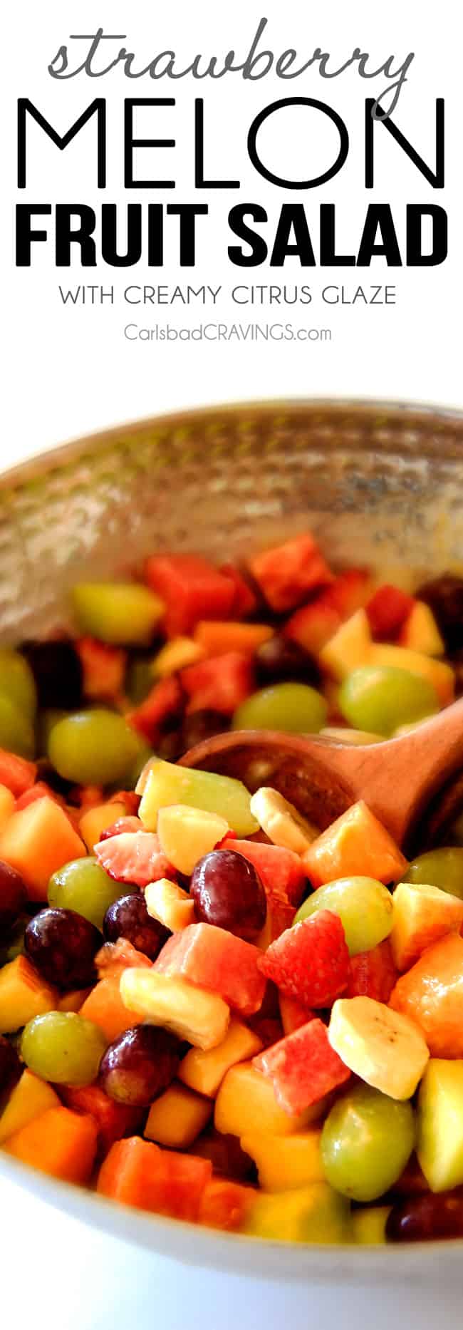 easy Watermelon Salad in a silver bowl with a servings spoon