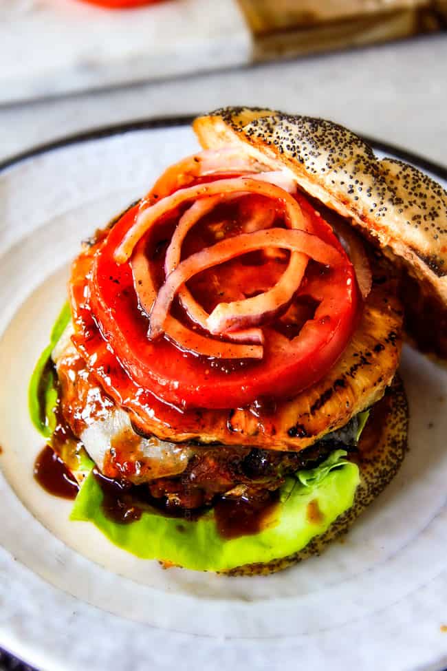 Amazingly juicy Hawaiian Burgers BURSTING with flavor, smothered in Havarti cheese, more Hawaiian Sauce and topped with caramelized pineapple. This might be the best burger. EVER!