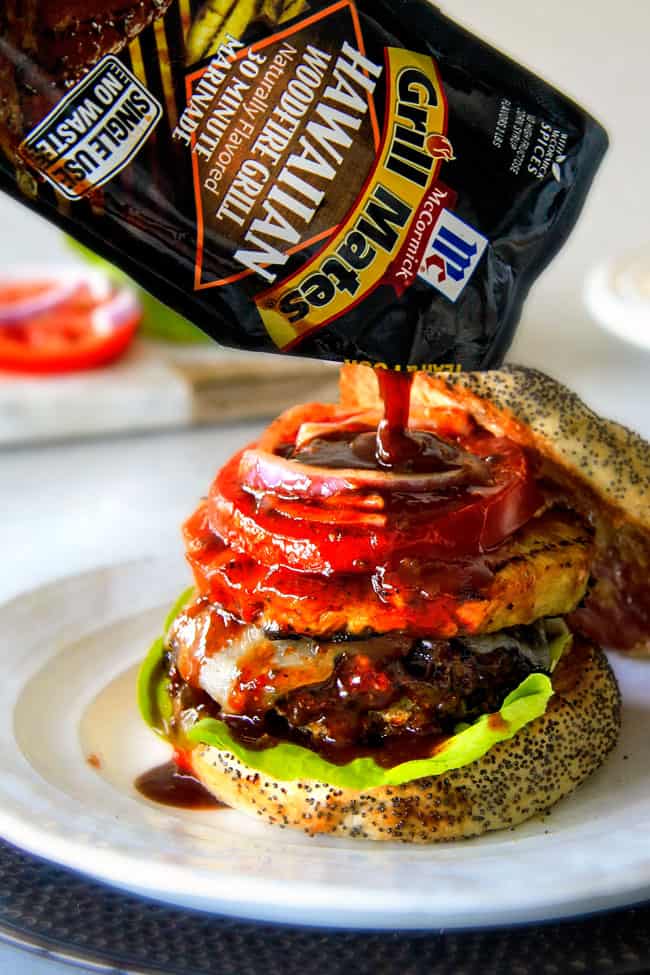 Amazingly juicy Hawaiian Burgers BURSTING with flavor, smothered in Havarti cheese, more Hawaiian Sauce and topped with caramelized pineapple. This might be the best burger. EVER! pouring Hawaiian Sauce all over an easy Hawaiian Burger with the top bun off